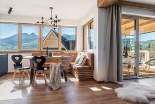 Дома для отпуска Osada Szeligówka - Premium Chalets Zakopane Косцелиско Bear Cottage with sauna and graduation tower-6